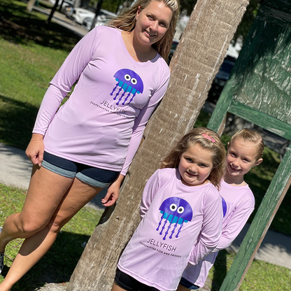 Woman and two girls wearing Lilac Jellyfish Sun Protective Long Sleeve Shirts by ShapeShifter Fish and Friends