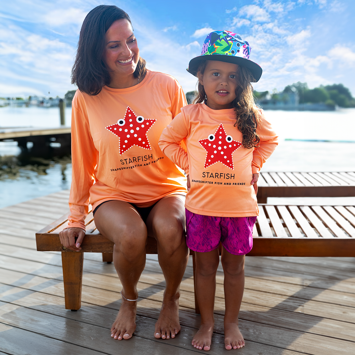Matching mom and daughter in Reversible Fish And Friends Bucket Hat UPF 50+ hat by ShapeShifter Fish and Friends lifestyle