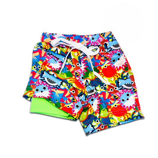 Upf50 Baby Swim Shorts With Chafe Free Liner Sun Protective Infant Swim Shorts For Beach Pool UPF 50+ sunwear by ShapeShifter Fish and Friends front view